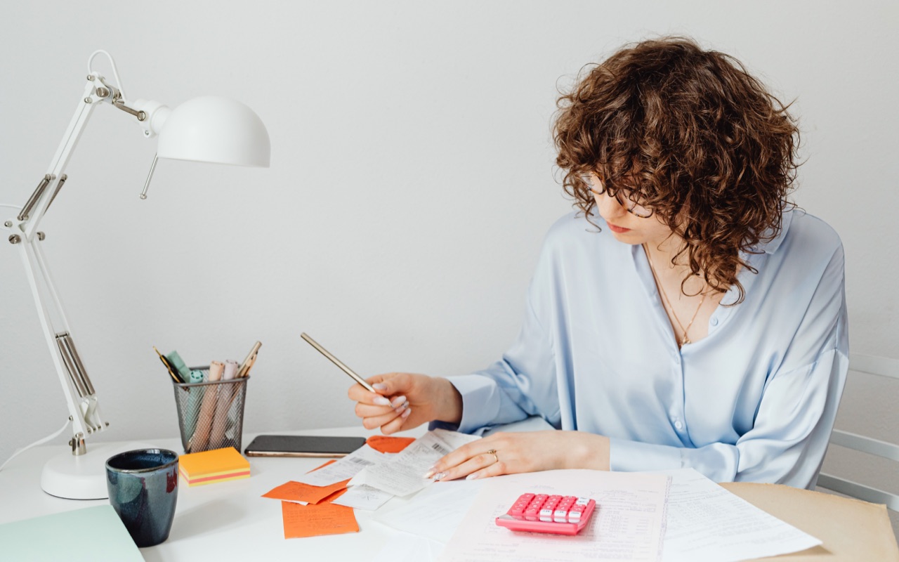 A business woman checking account statements