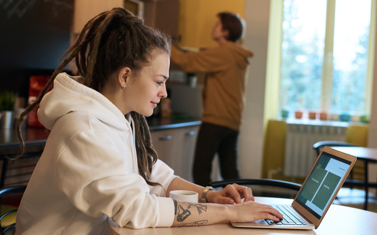 A freelancer working remotely from a cafe