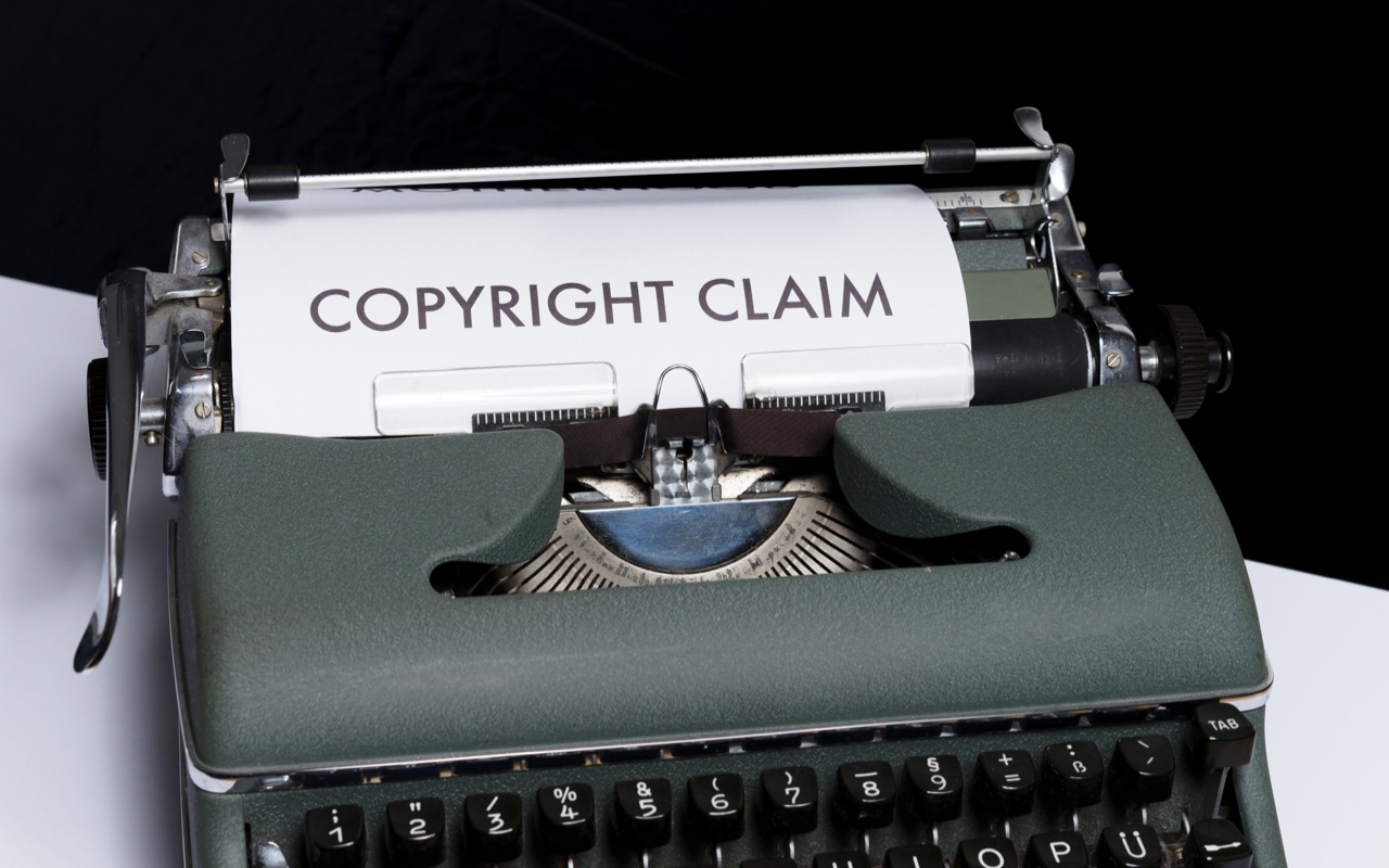 A copyright claim document in a typewriter