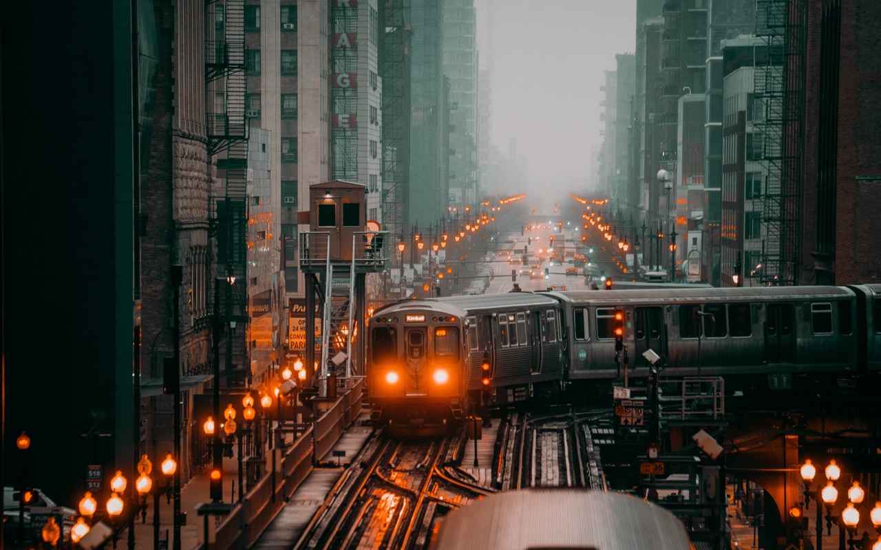 A train on elevated tracks in a city