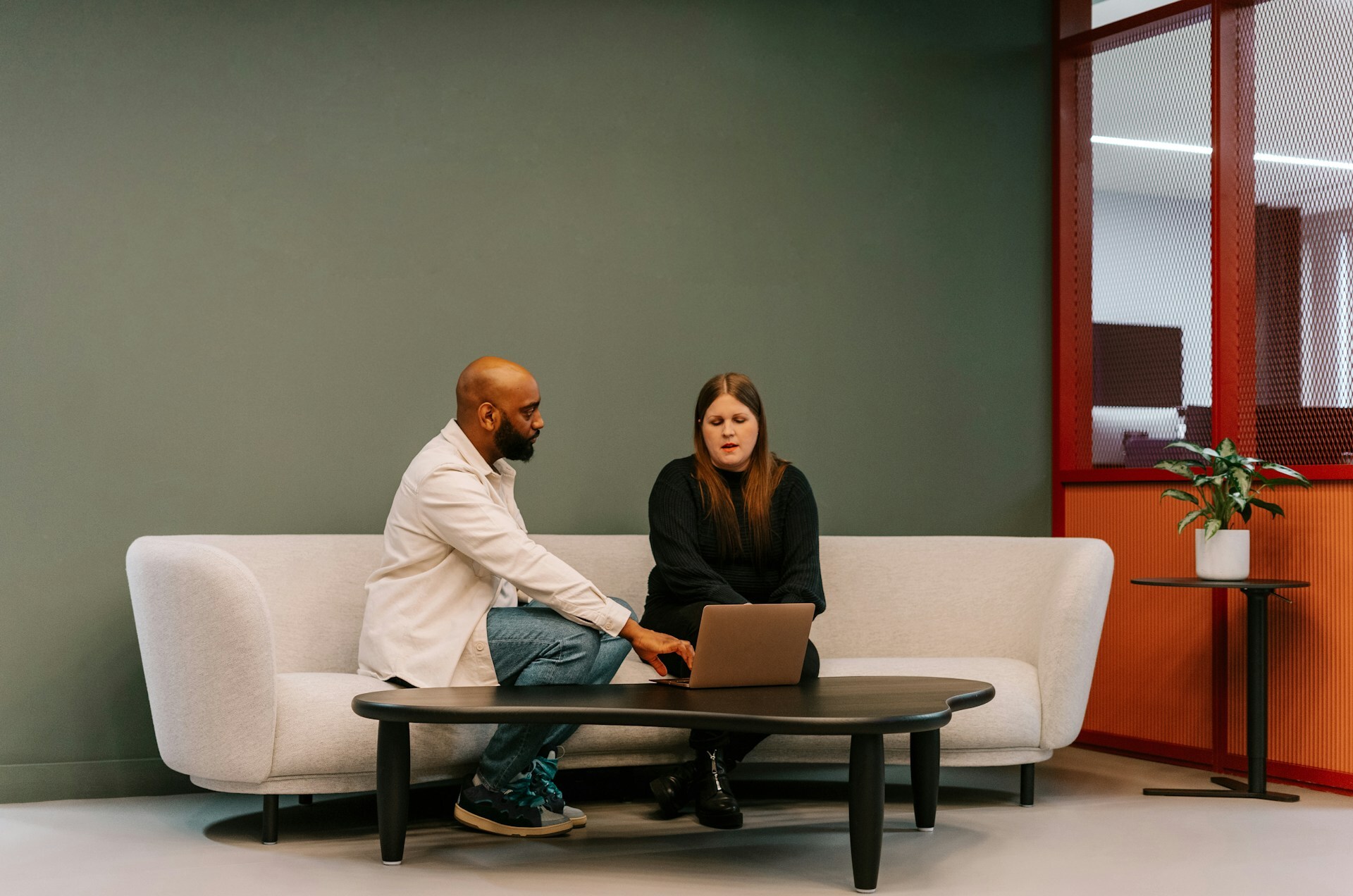 A man and a woman having a professional meeting