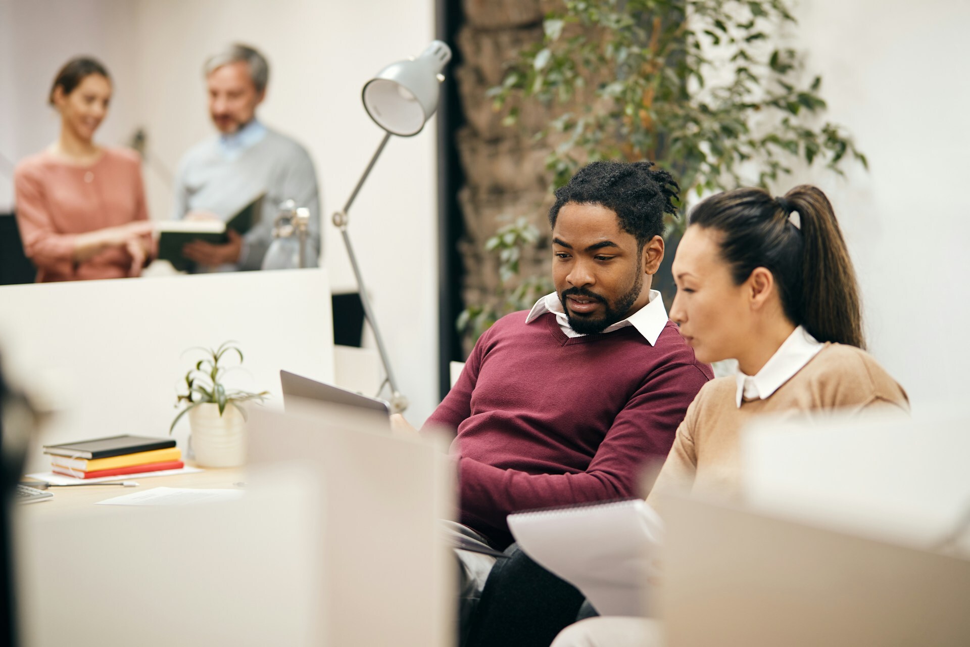 A business meeting with four people