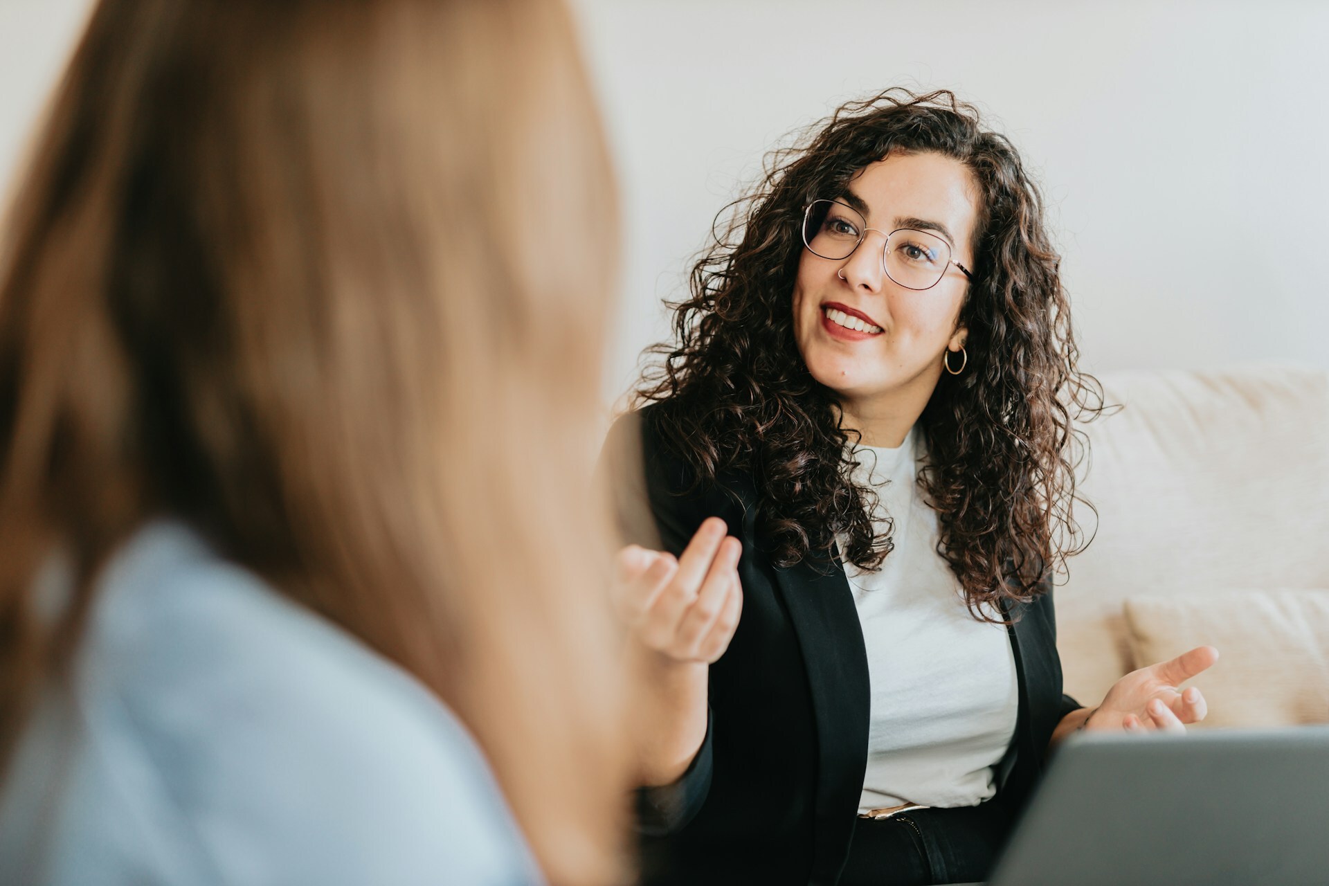 Two business women meeting at a table