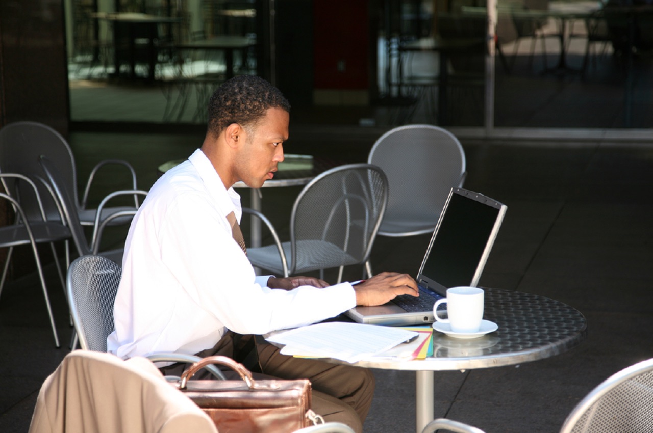 Man working at a coffee shop